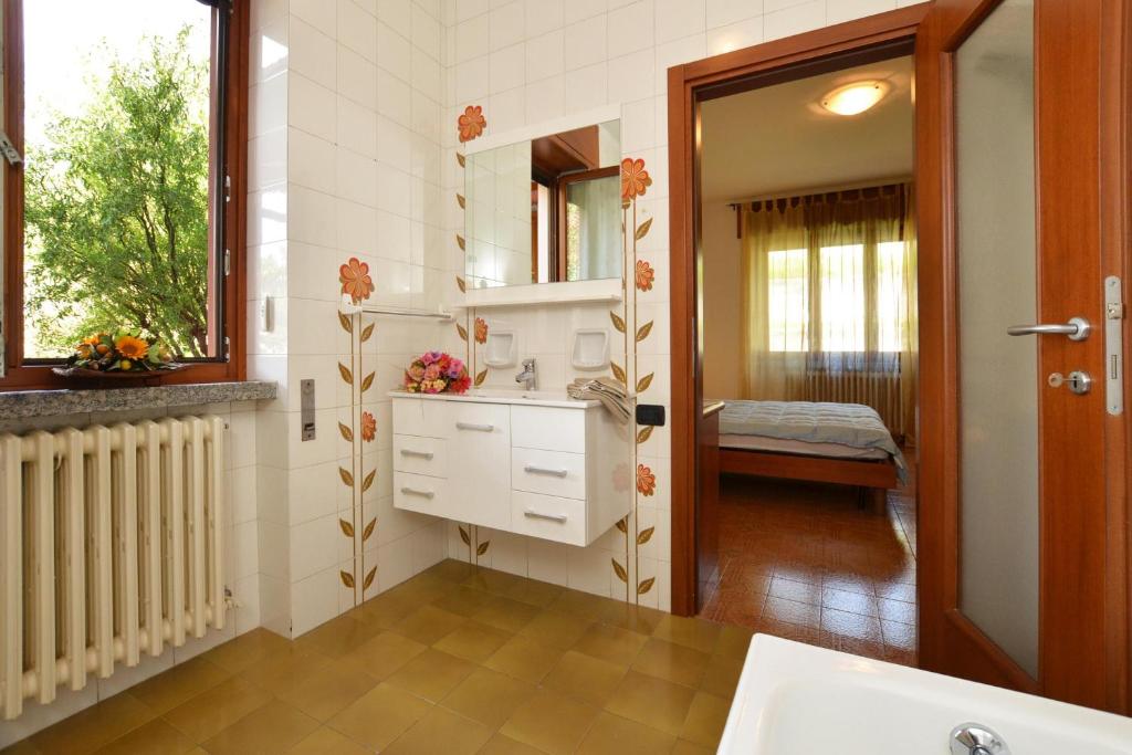 Łóżko lub łóżka w pokoju w obiekcie Casa Virginia