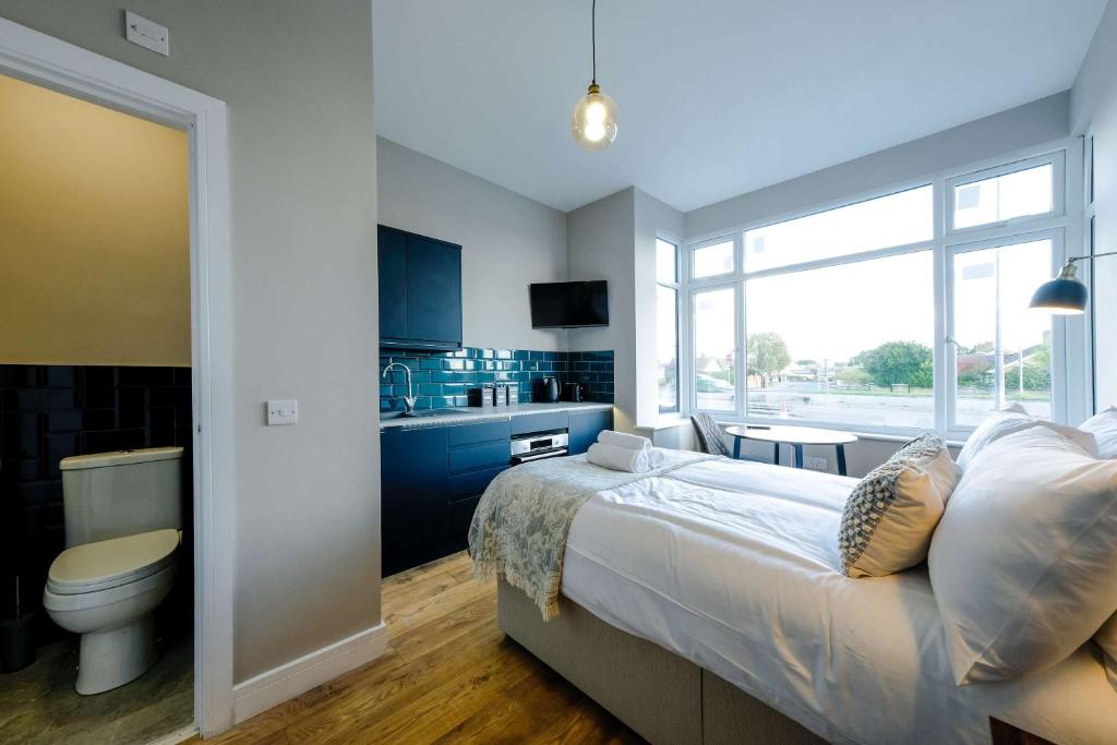 En eller flere senge i et værelse på The Willow studio 4