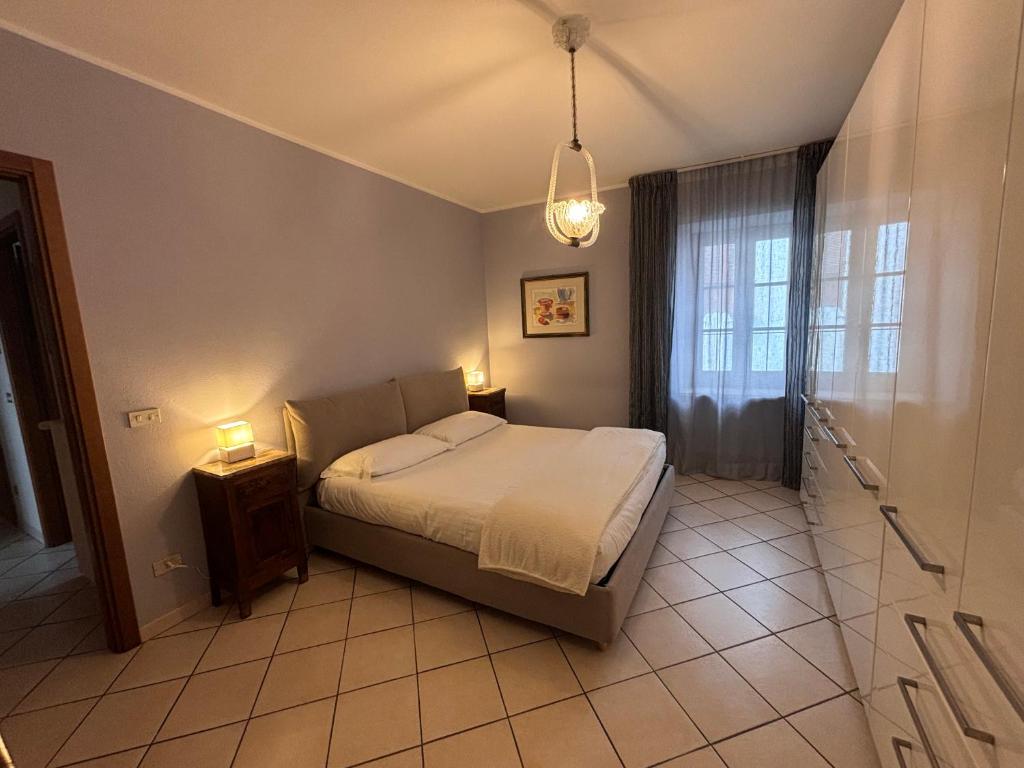 Postel nebo postele na pokoji v ubytování Gemma Fiorita Casa Vacanze