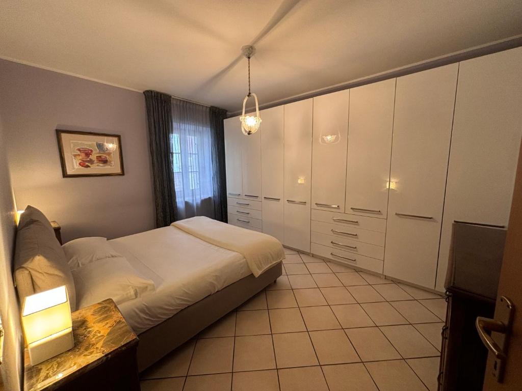 Postel nebo postele na pokoji v ubytování Gemma Fiorita Casa Vacanze