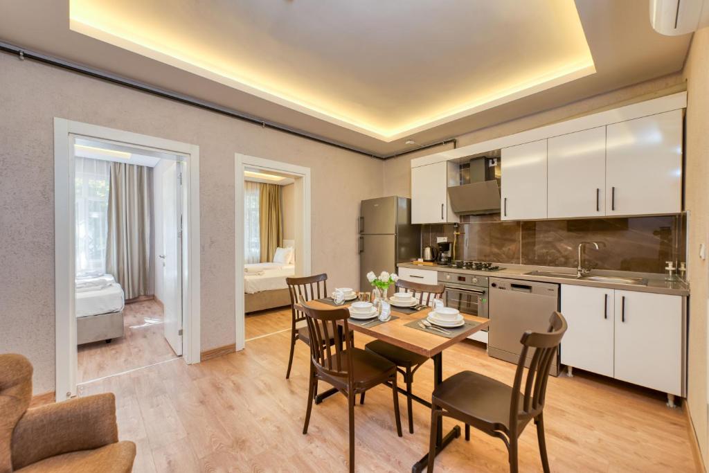 Kuchyň nebo kuchyňský kout v ubytování Port Apart Hotel