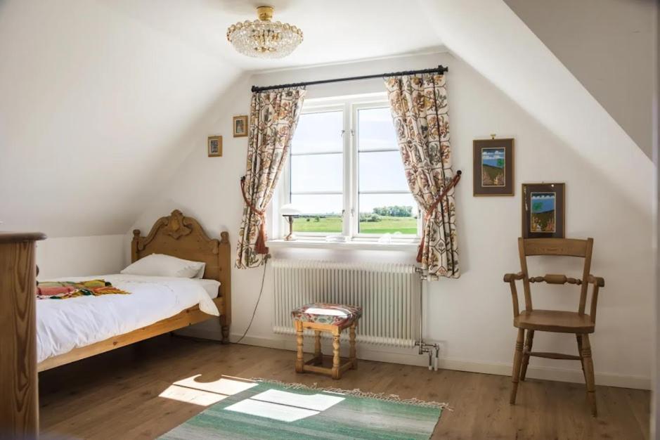 Postel nebo postele na pokoji v ubytování Gladsax Gamla Gård luxury holiday home