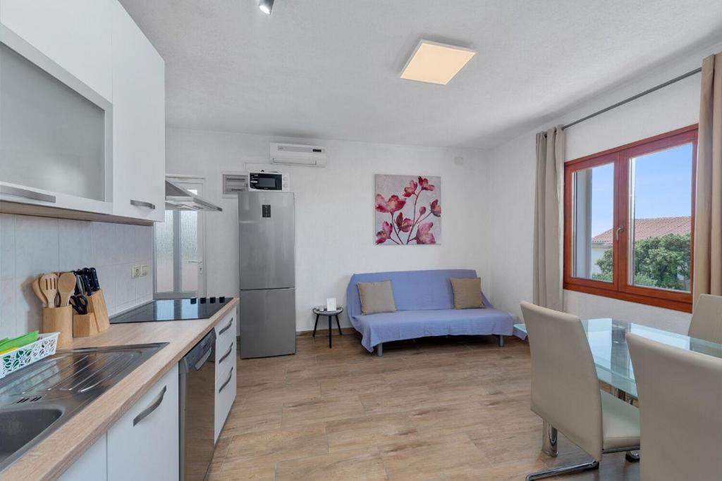 Kuchyň nebo kuchyňský kout v ubytování Apartment Uga2