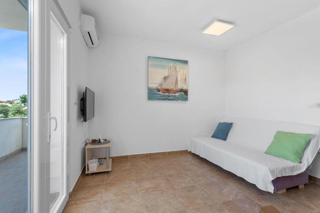 TV a/nebo společenská místnost v ubytování Apartment Uga2