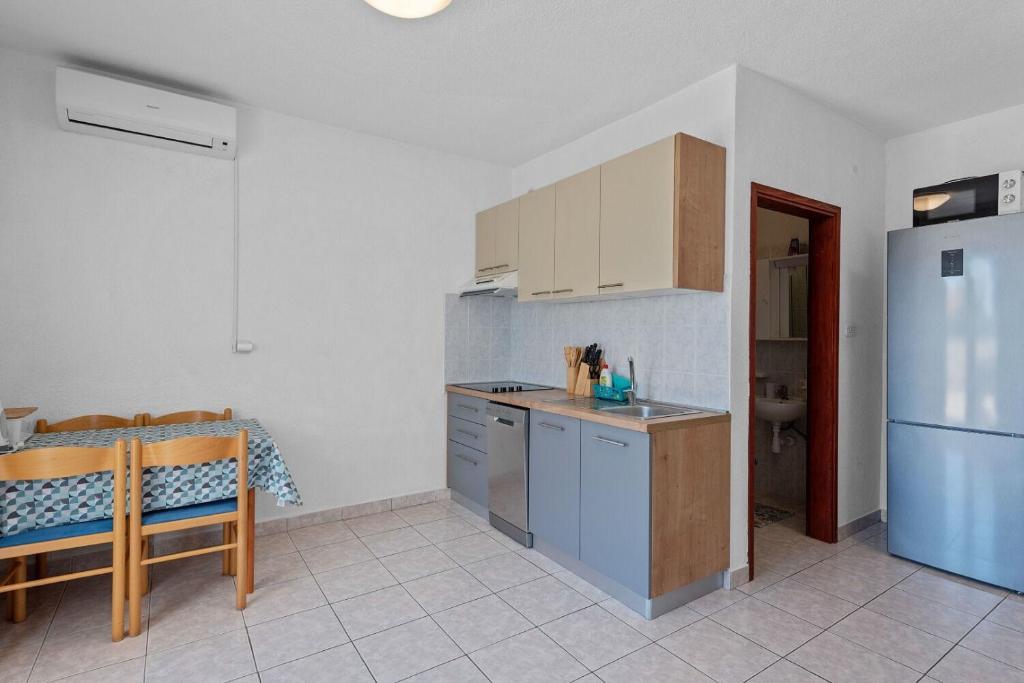Kuchyň nebo kuchyňský kout v ubytování Apartment Uga2