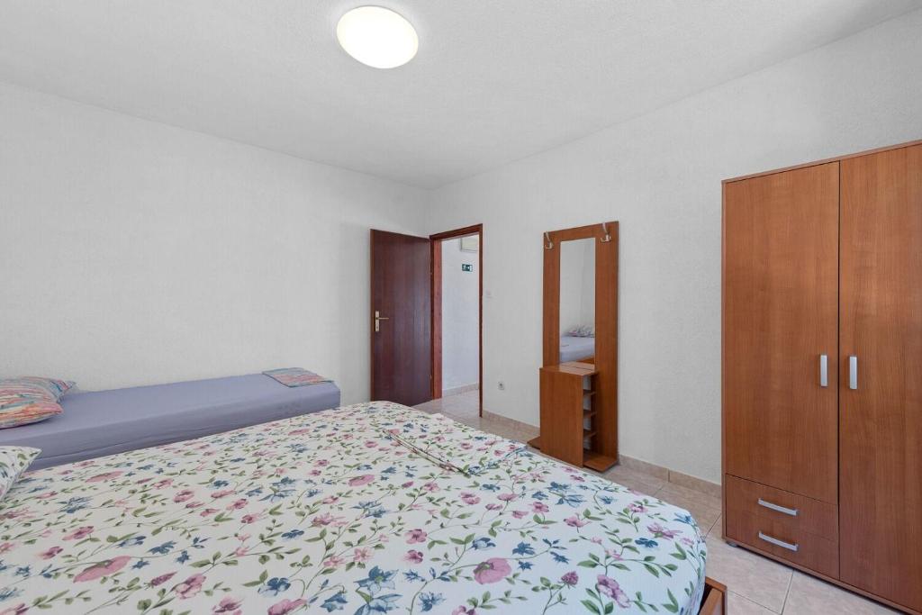 Postel nebo postele na pokoji v ubytování Apartment Uga2