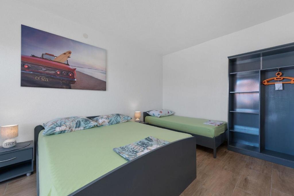 Postel nebo postele na pokoji v ubytování Apartment Uga2