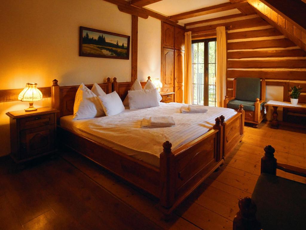 Posteľ alebo postele v izbe v ubytovaní Hotel Na Vyhlídce