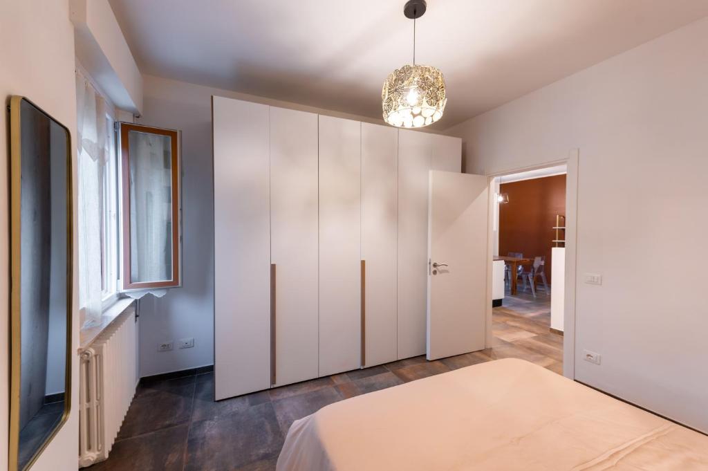 Postel nebo postele na pokoji v ubytování Appartamento San Rocco a Tortona