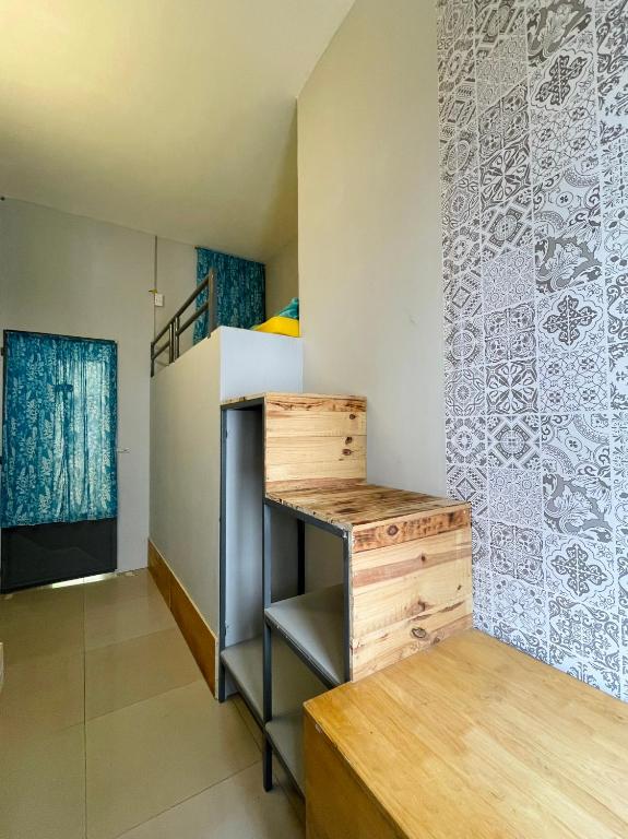 Postel nebo postele na pokoji v ubytování Da Lat Lemongrass - Đà Lạt Sả