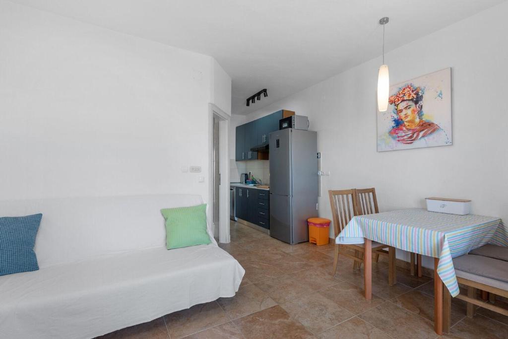 Kuchyň nebo kuchyňský kout v ubytování Apartment Uga2