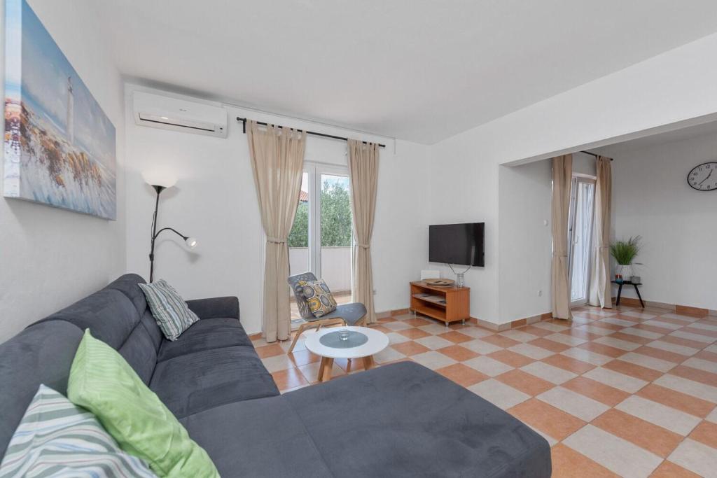 TV a/nebo společenská místnost v ubytování Apartment Uga2