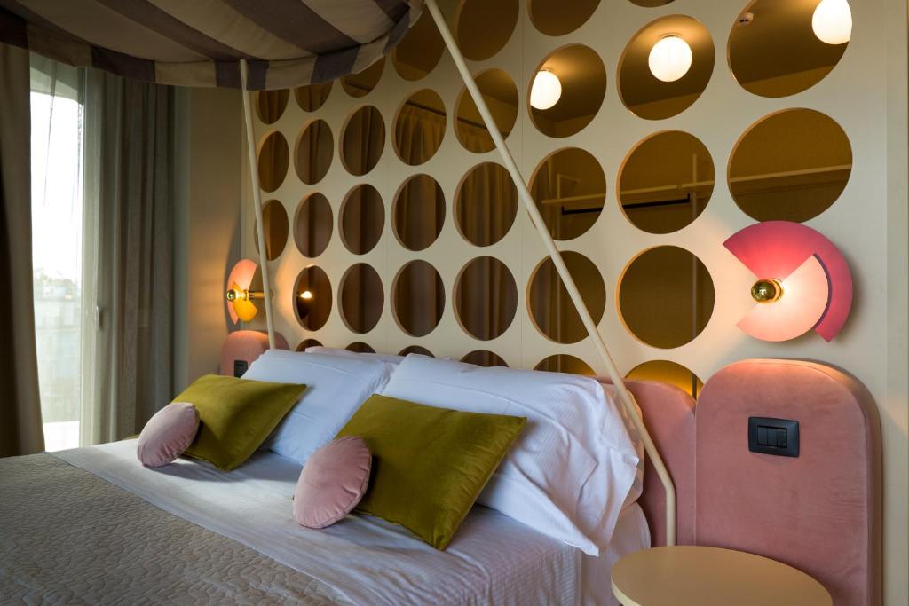 Postel nebo postele na pokoji v ubytování Hotel La Gradisca