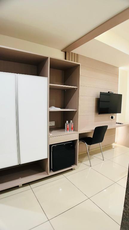Kuchyň nebo kuchyňský kout v ubytování Hotel Ashray Inn Express