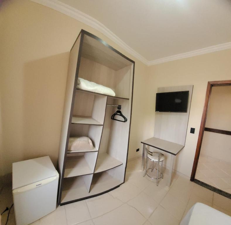 Postel nebo postele na pokoji v ubytování Hotel Globo