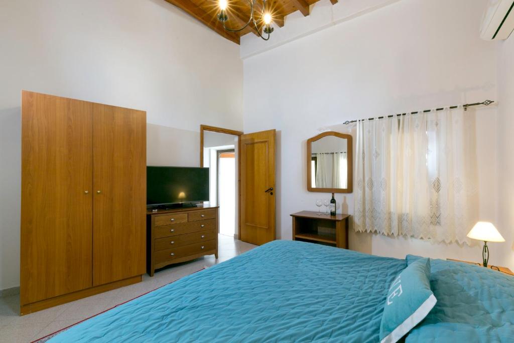 Postel nebo postele na pokoji v ubytování Evdokia Boutique Hotel