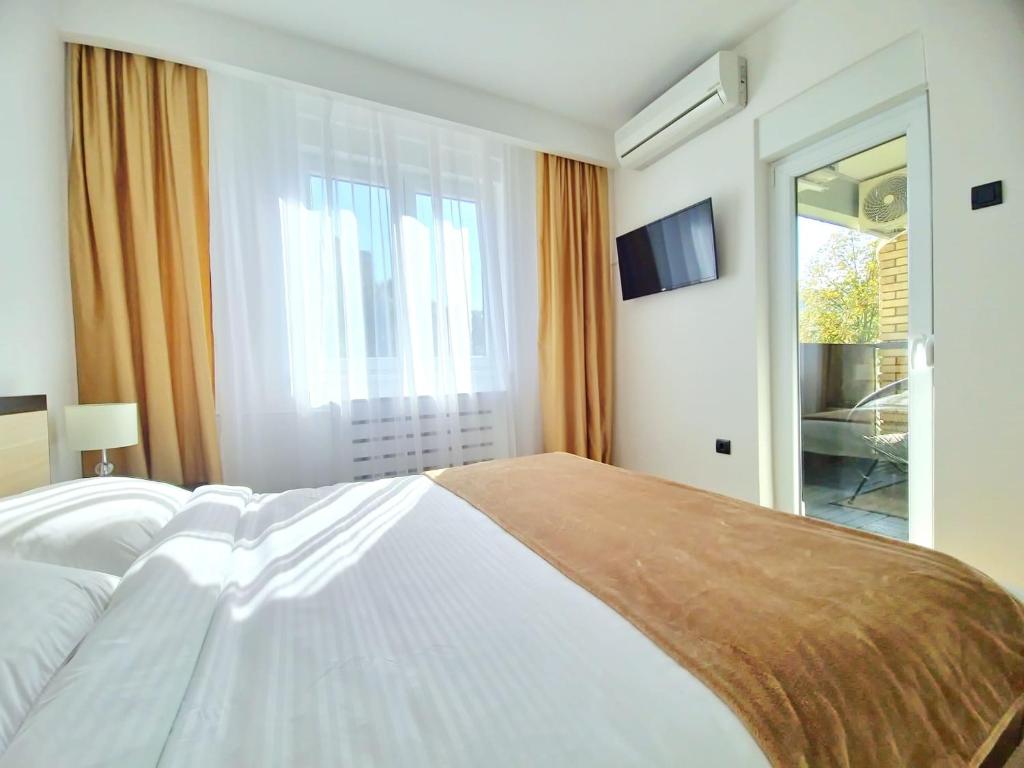 Postel nebo postele na pokoji v ubytování Linden Avenue Apartment - self check in