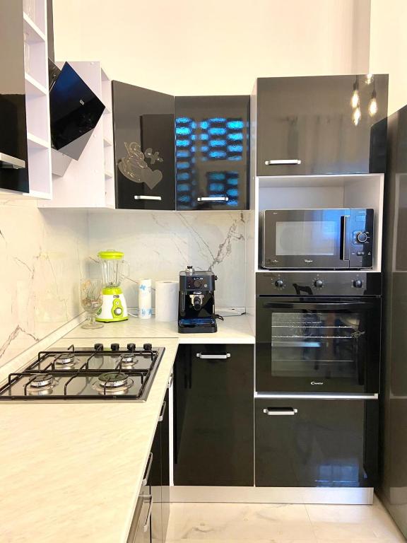 Kuchyň nebo kuchyňský kout v ubytování A-B House