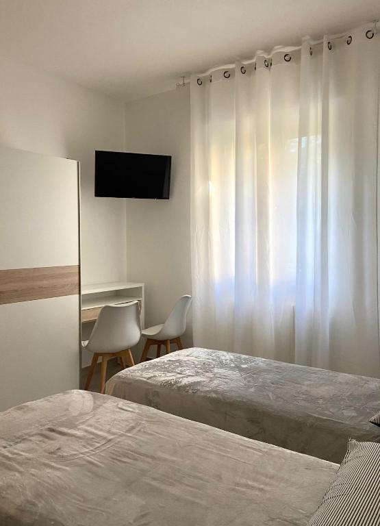 Postel nebo postele na pokoji v ubytování A-B House