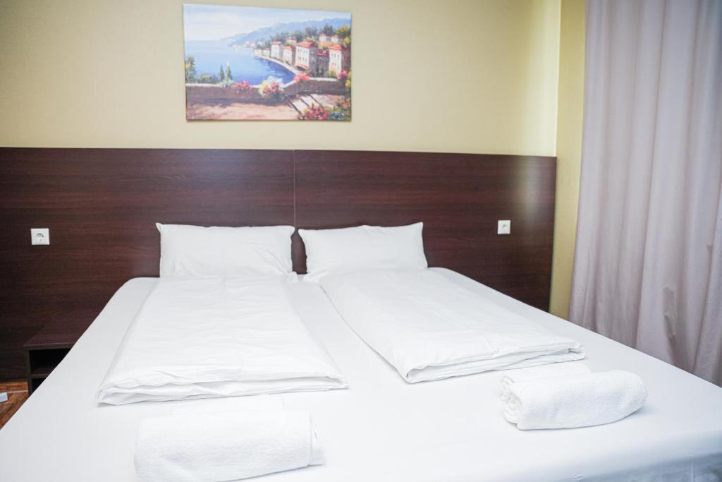 Postel nebo postele na pokoji v ubytování Hotel City Star