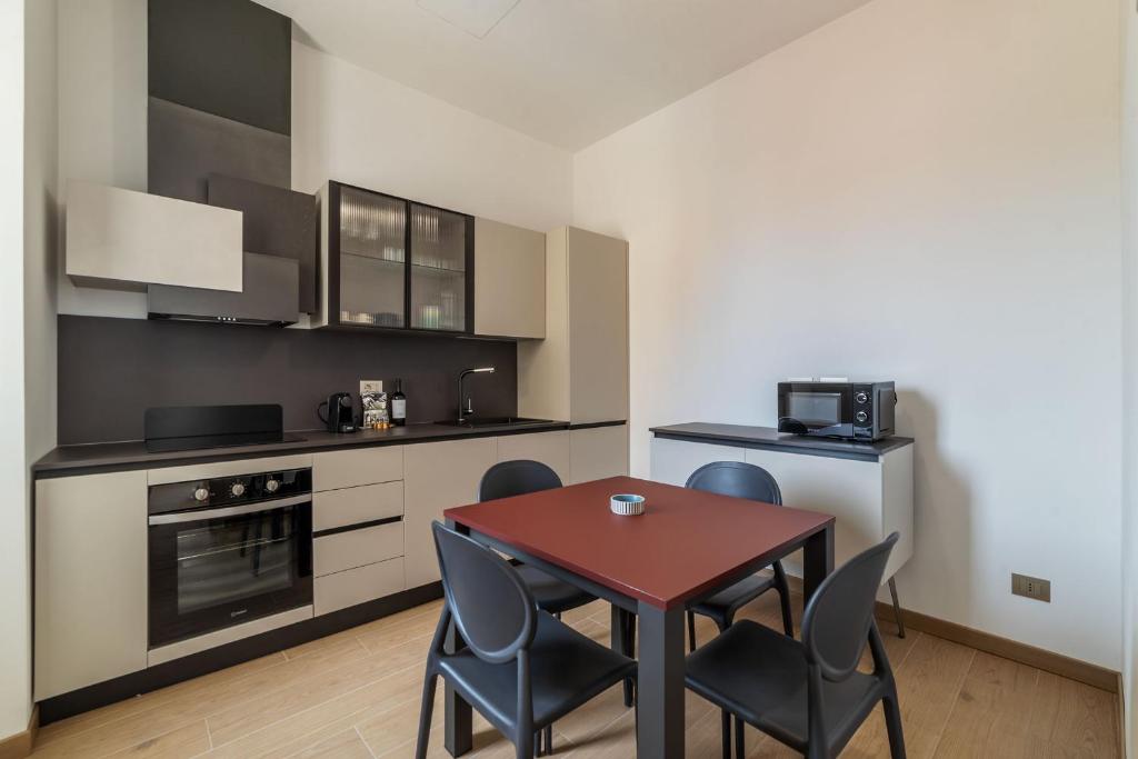 Köök või kööginurk majutusasutuses JOIVY Cavour Luxury Apartments