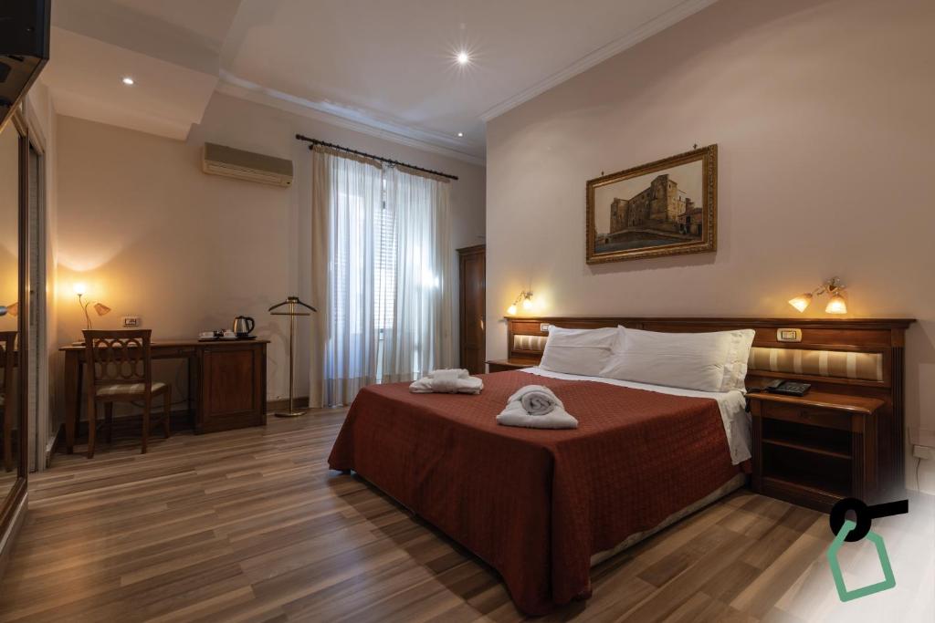 Postel nebo postele na pokoji v ubytování HOTIDAY Room Collection - Palermo Politeama
