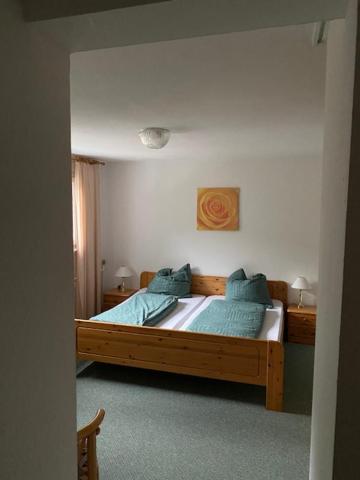 Postel nebo postele na pokoji v ubytování Hotel Waldeck in Todtnau