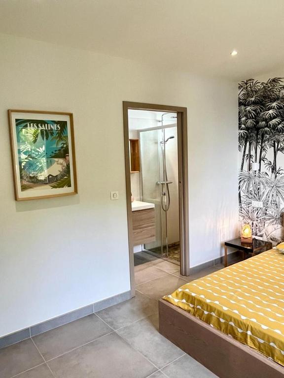 Postel nebo postele na pokoji v ubytování Villa Ti Alizés