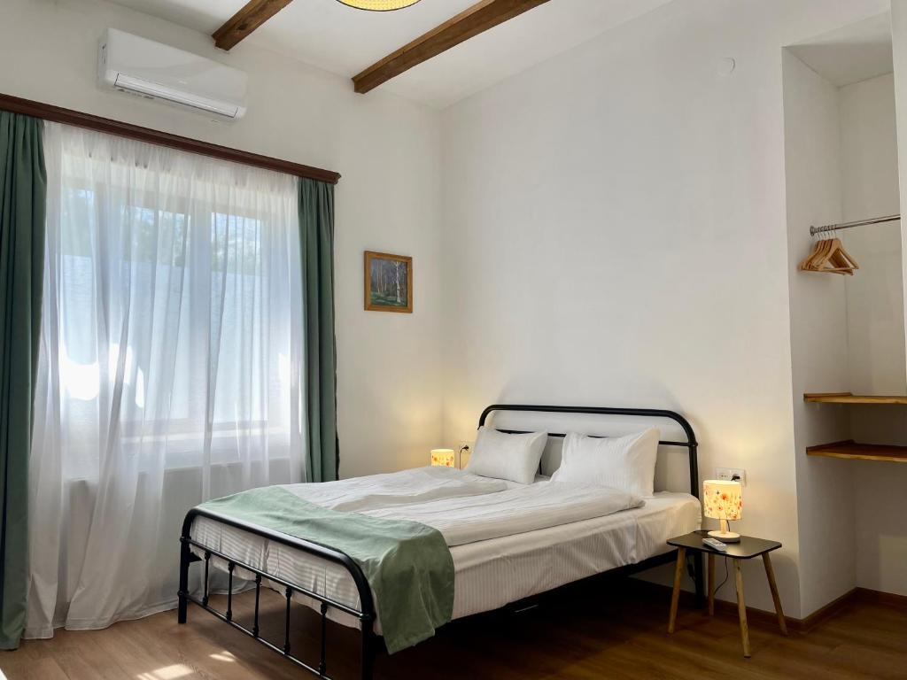 Postel nebo postele na pokoji v ubytování Friendly Home