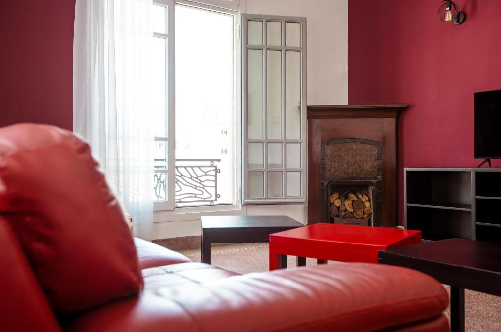 TV a/nebo společenská místnost v ubytování Appartements Balima Harcourt DeLuxe