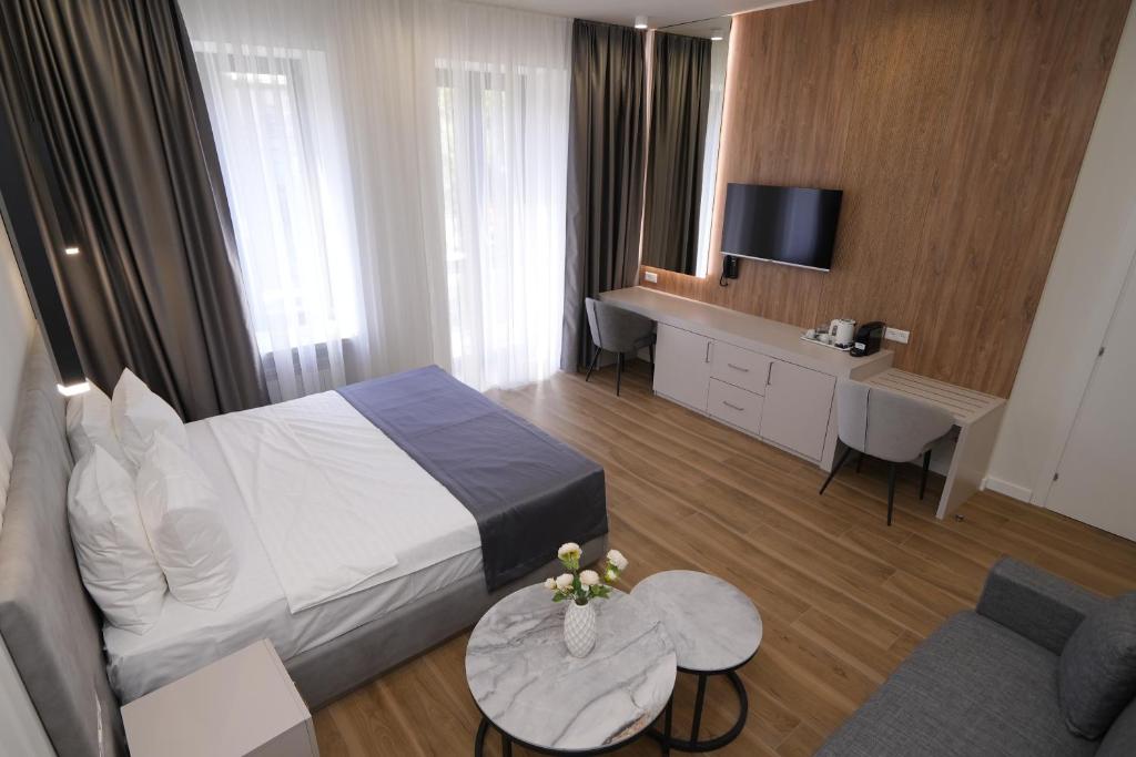 Postel nebo postele na pokoji v ubytování Ser In Hotel
