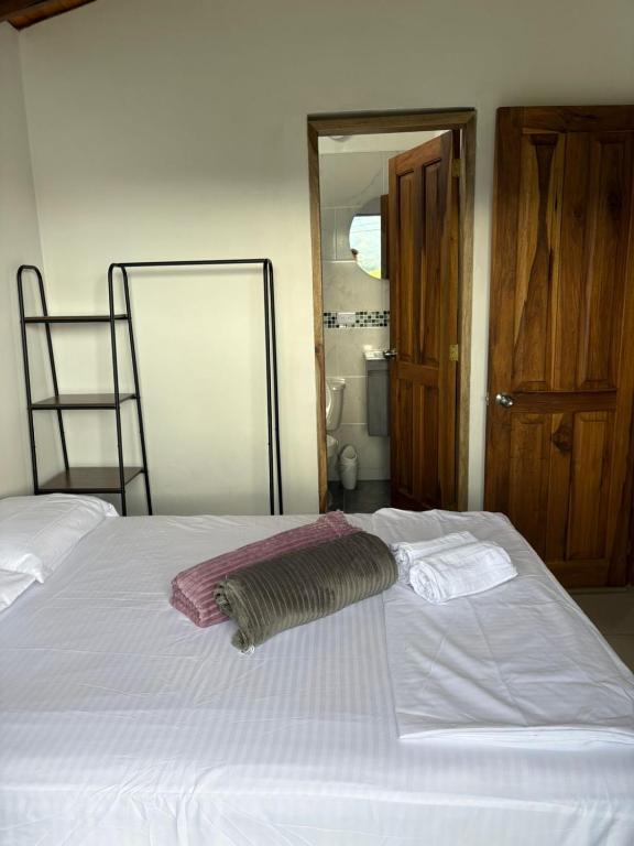 Postel nebo postele na pokoji v ubytování Casa Pino Campestre Panorámica
