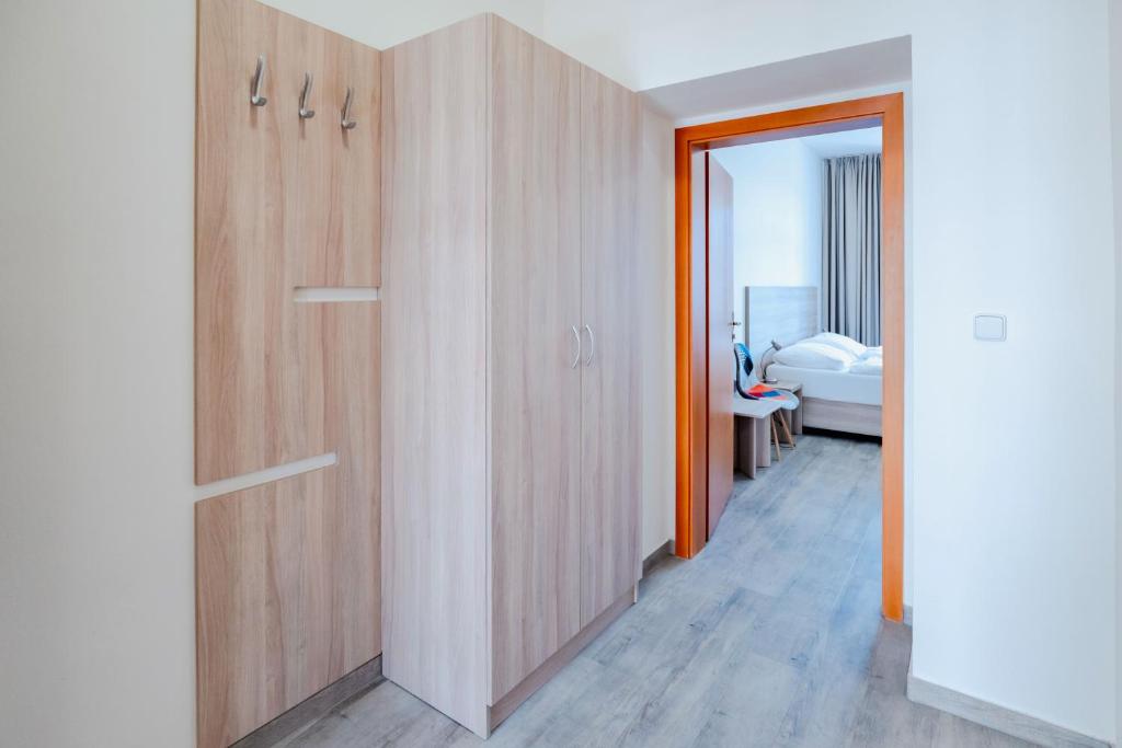 Postel nebo postele na pokoji v ubytování Hotel Palác Elektra