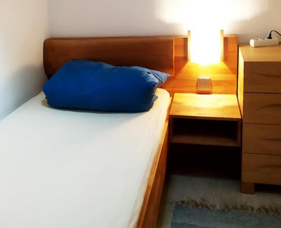 Postel nebo postele na pokoji v ubytování Ferienwohnung Langenstadt