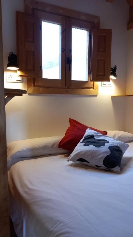 Postel nebo postele na pokoji v ubytování Camping IZARPE