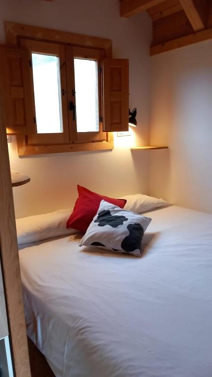 Postel nebo postele na pokoji v ubytování Camping IZARPE