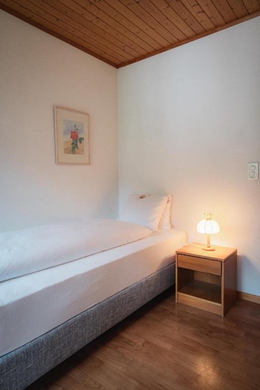 Postel nebo postele na pokoji v ubytování Hotel Haus Schönstatt contactless-Check-In