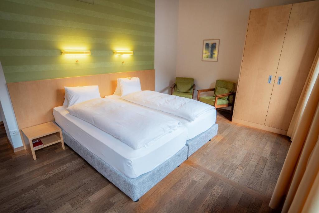 Postel nebo postele na pokoji v ubytování Hotel Haus Schönstatt contactless-Check-In