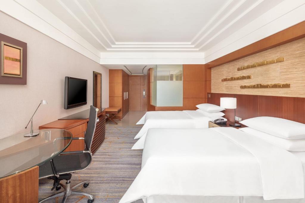 TV a/nebo společenská místnost v ubytování Sheraton Xiamen Hotel