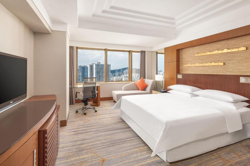 Postel nebo postele na pokoji v ubytování Sheraton Xiamen Hotel