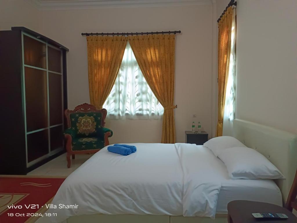 Postel nebo postele na pokoji v ubytování VILLA SHAMIR