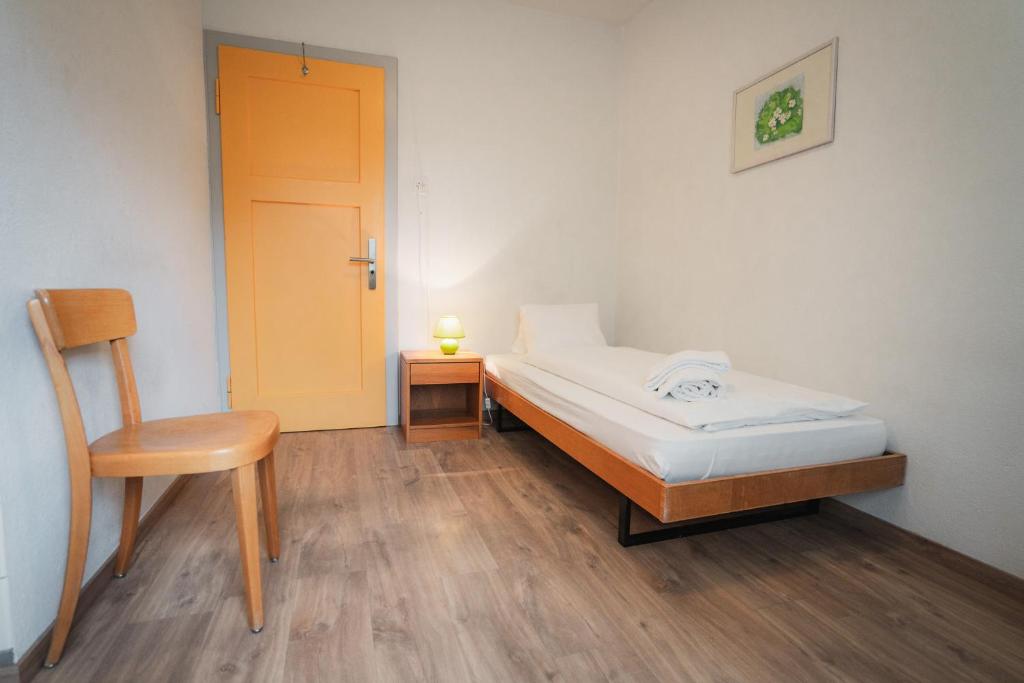 Postel nebo postele na pokoji v ubytování B&B Haus Schönstatt contactless- Check-In