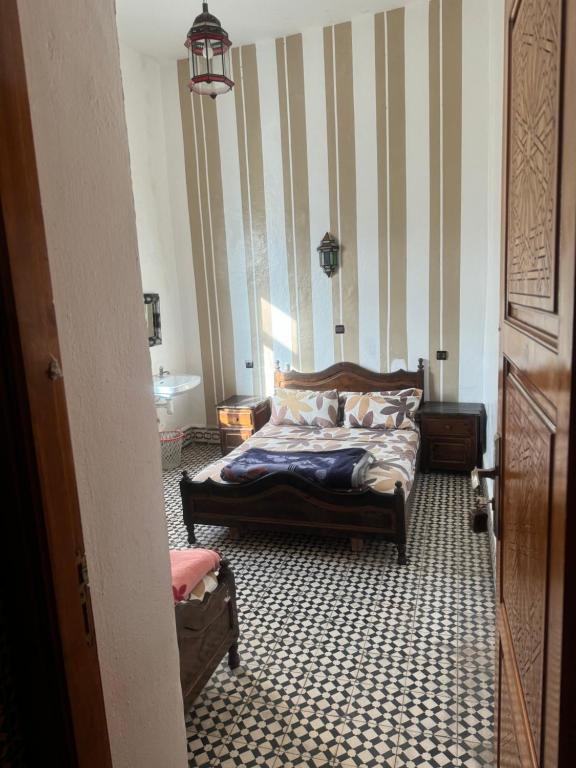 Postel nebo postele na pokoji v ubytování Hotel majestc