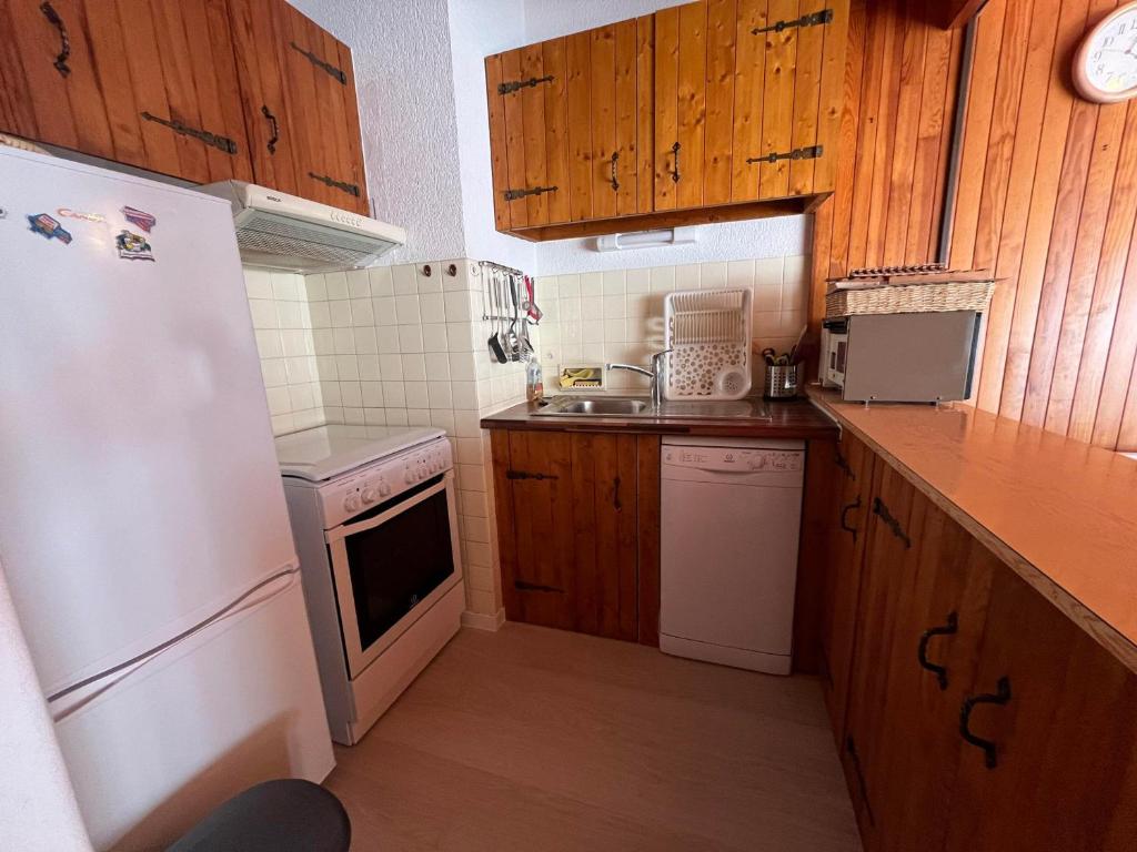 Kuchyň nebo kuchyňský kout v ubytování Appt. central à Châtel - Parking, WIFI, Animaux admis, 4 pers. - FR-1-198-176