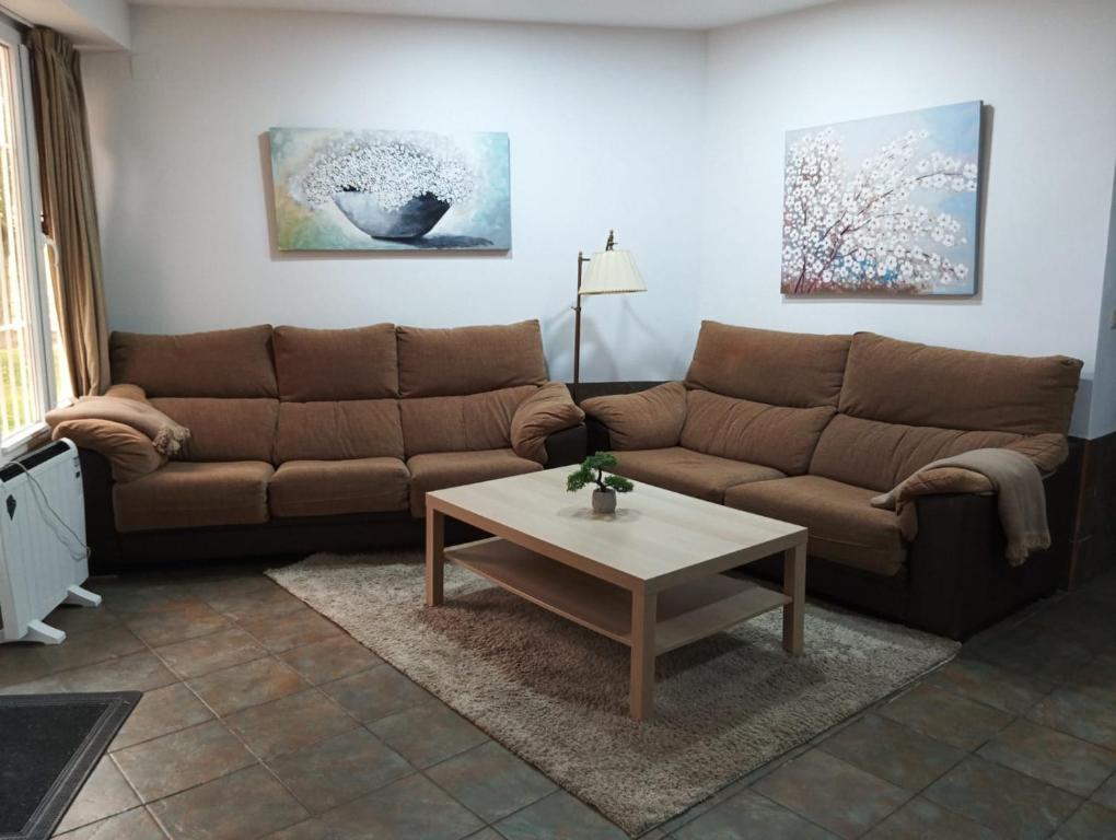 a living room with a couch and a coffee table at Sierra Nevada in Sierra Nevada