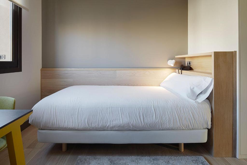 Postel nebo postele na pokoji v ubytování Hotel Imaz