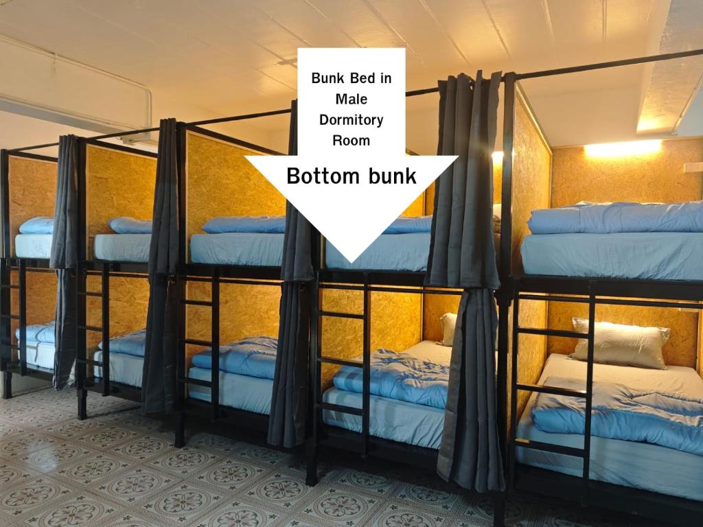 Postel nebo postele na pokoji v ubytování Phuket Inn Patong Hub