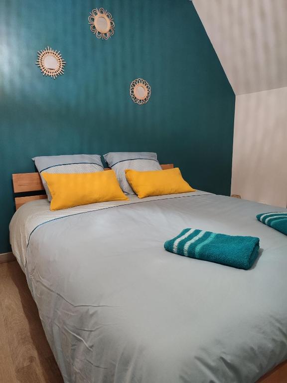 Postel nebo postele na pokoji v ubytování Gîte Bienvenue chez Naty