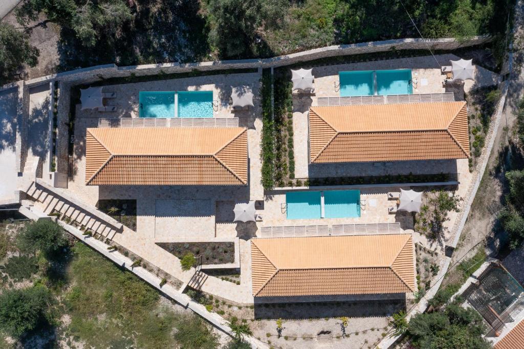Bazén v ubytování ULIVETO PAXOS nebo v jeho okolí
