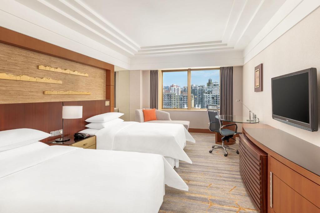 TV a/nebo společenská místnost v ubytování Sheraton Xiamen Hotel